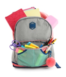 Backpack with school stationery on white background