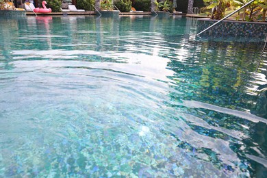 Photo of Clear water with ripples in outdoor swimming pool