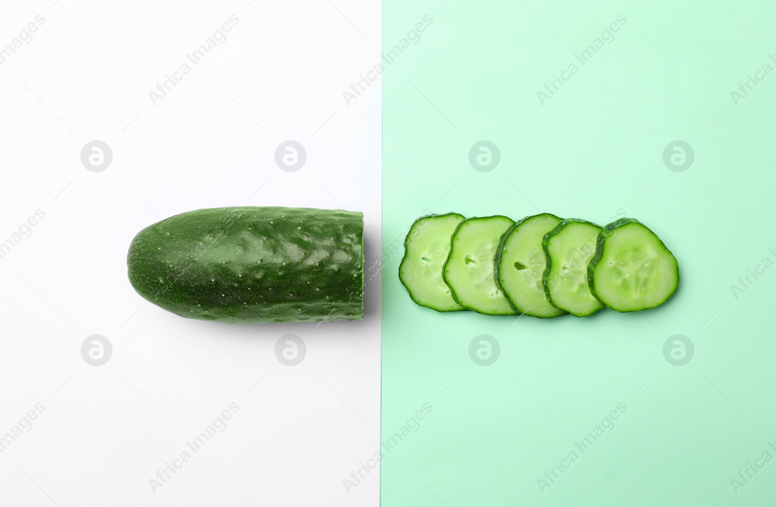 Photo of Flat lay composition with cut cucumber on color background