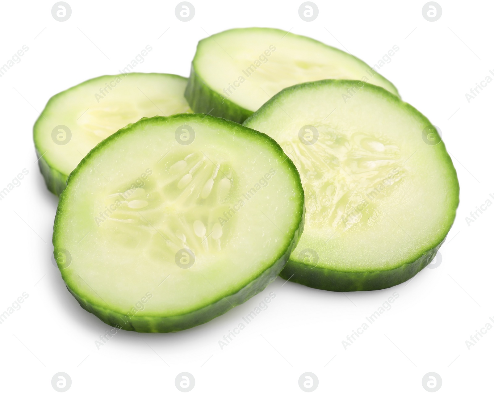 Photo of Slices of fresh cucumber isolated on white