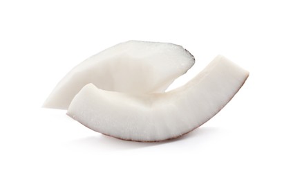 Photo of Pieces of ripe coconut on white background