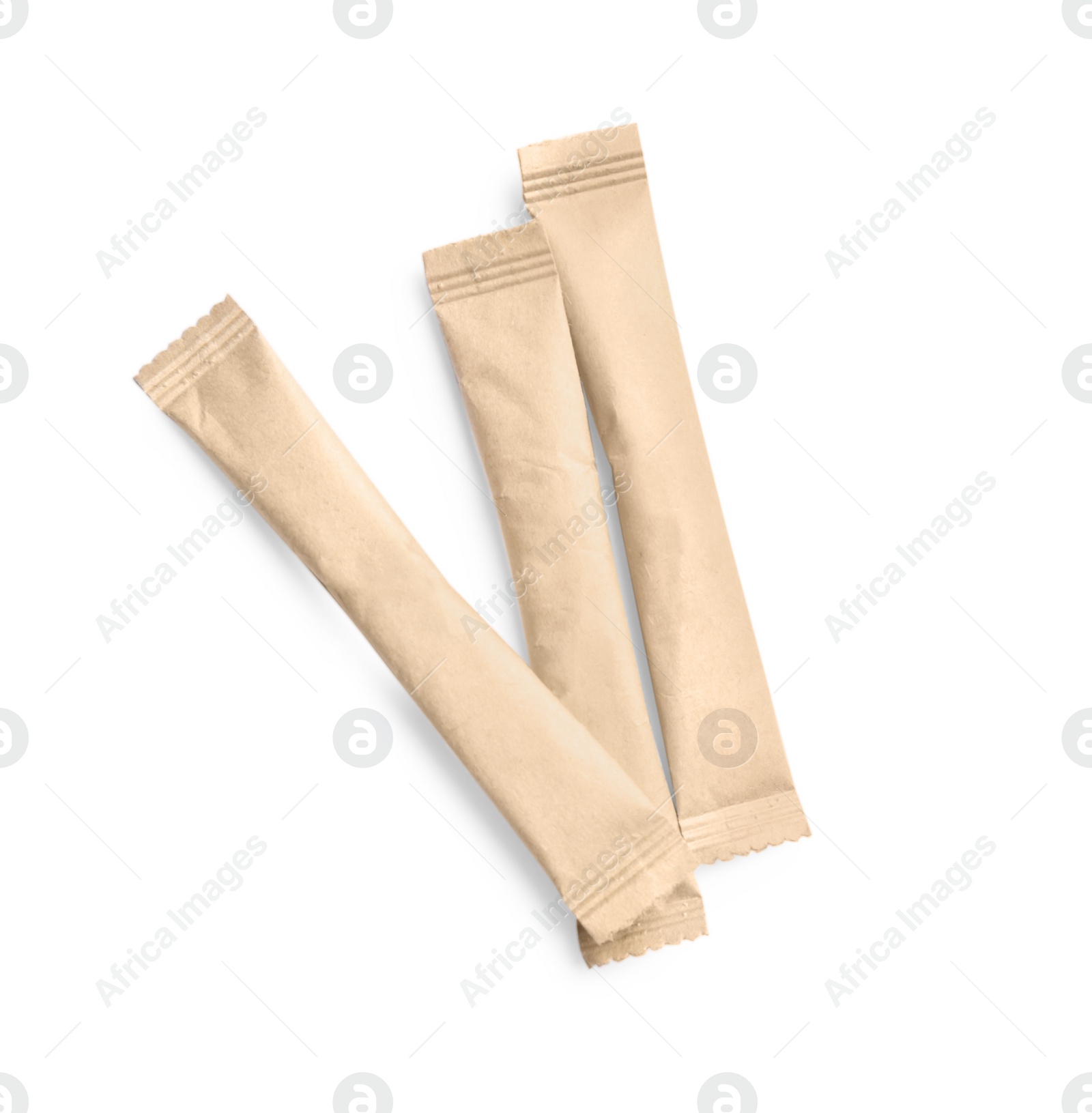 Photo of Beige sticks of sugar on white background, top view