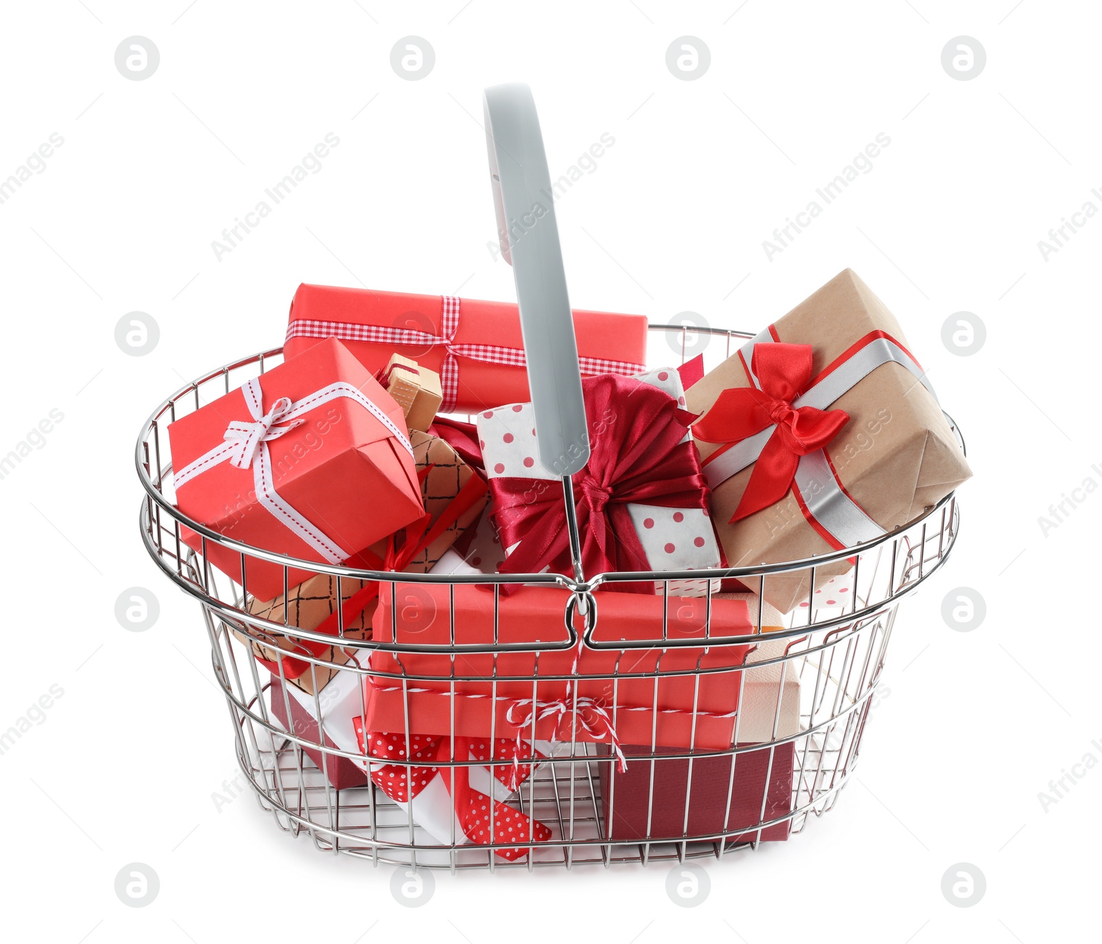 Photo of Shopping basket full of gift boxes on white background