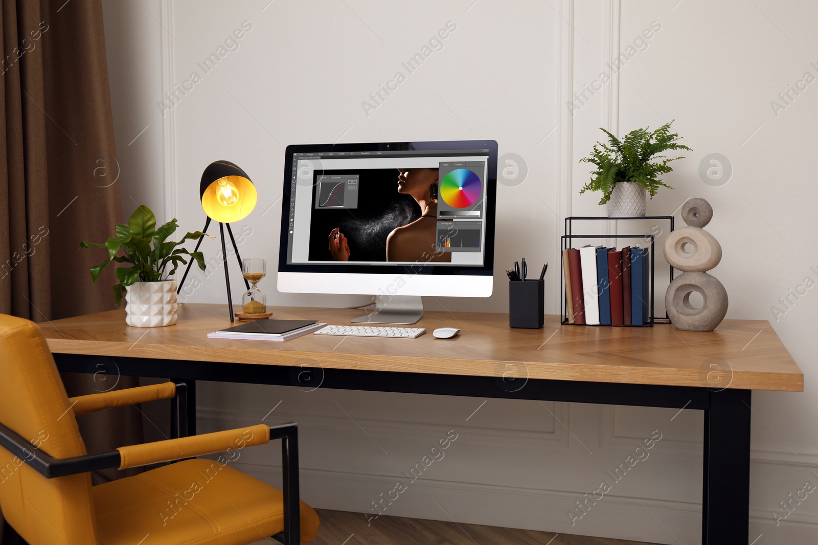 Image of Designer's workplace. Computer with photo editor application on table indoors