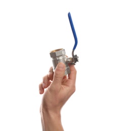 Male plumber holding water valve on white background, closeup