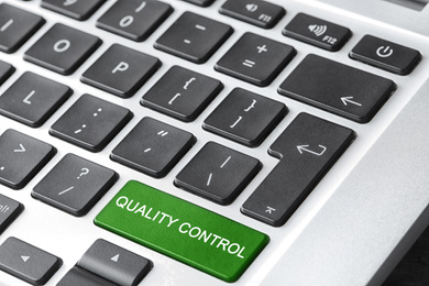 Image of Quality control button on modern computer keyboard, closeup