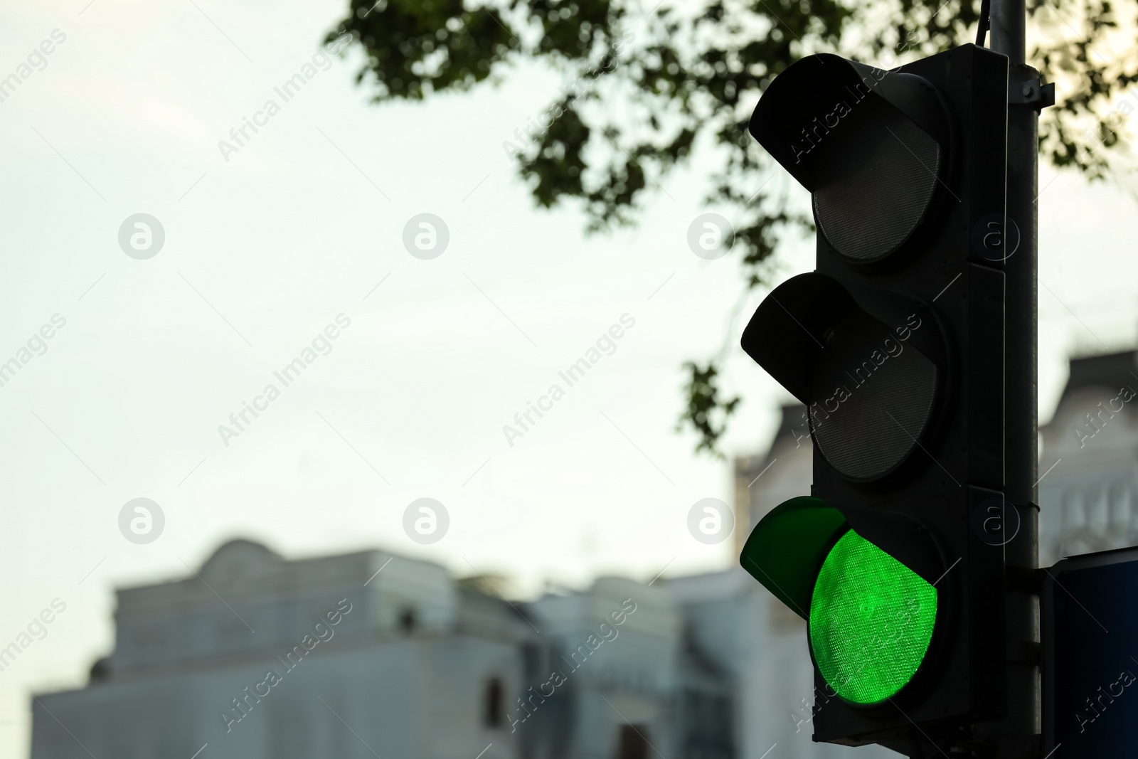 Photo of View of traffic light in city, space for text