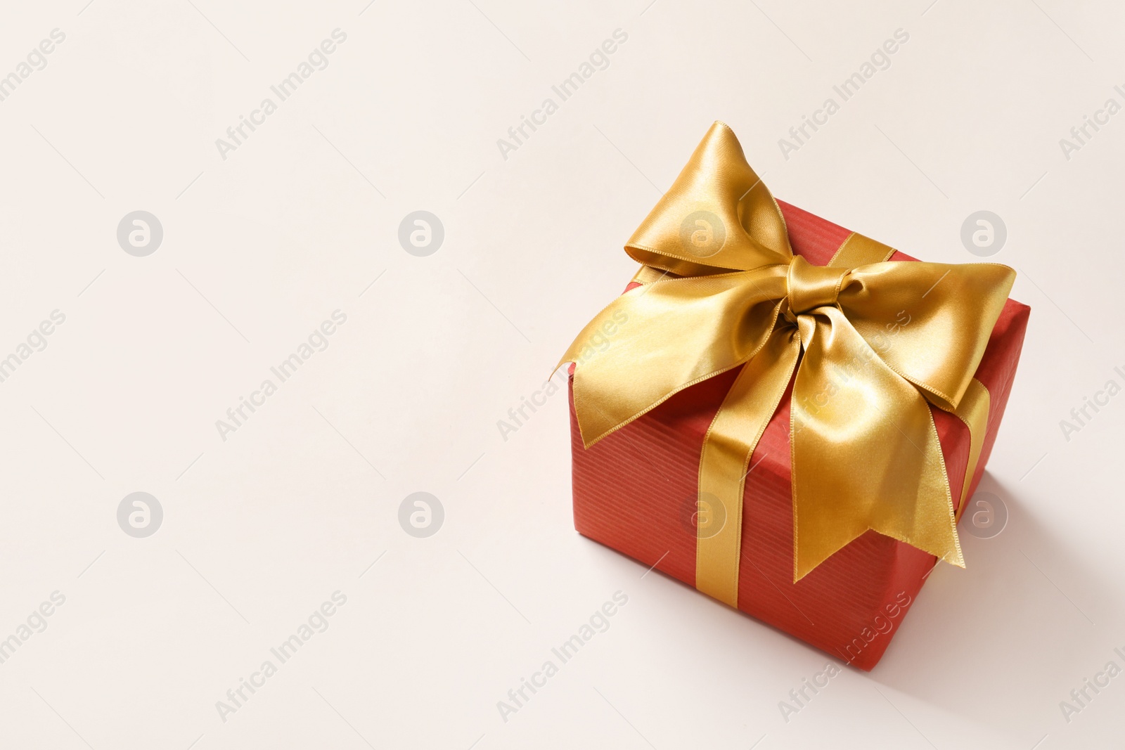 Photo of Beautiful gift box on light background