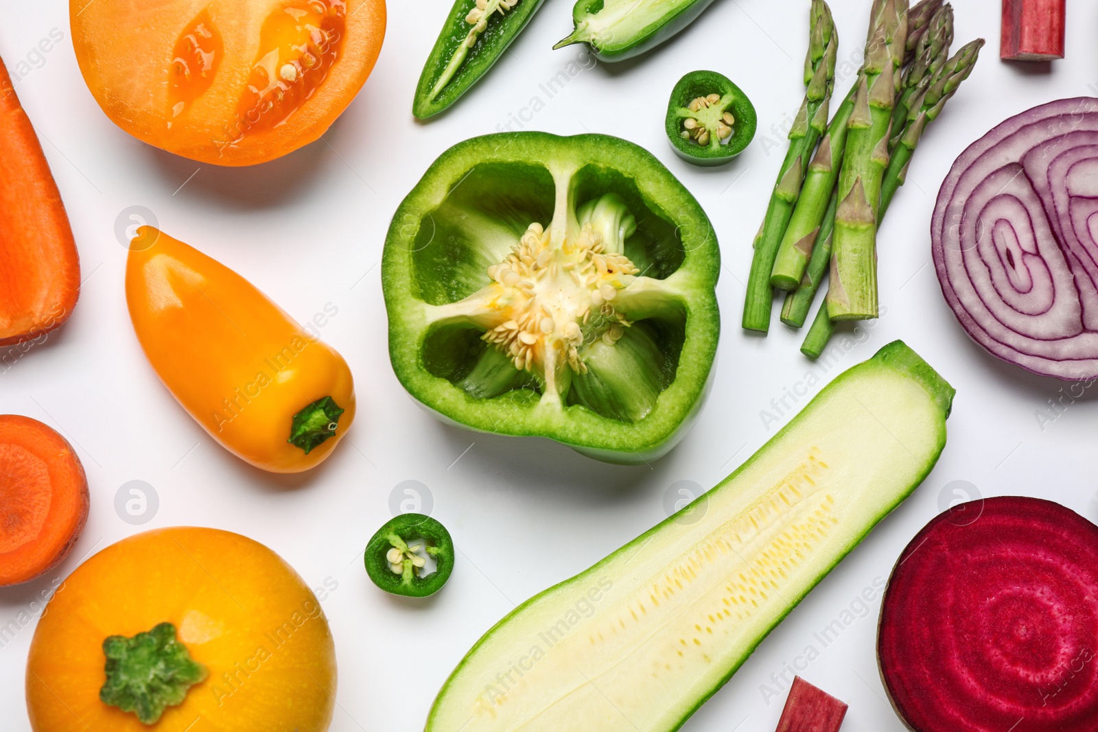 Photo of Different fresh vegetables on white background, top view