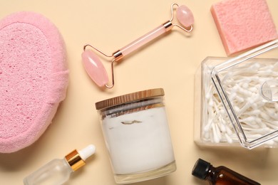 Bath accessories. Flat lay composition with personal care products on beige background