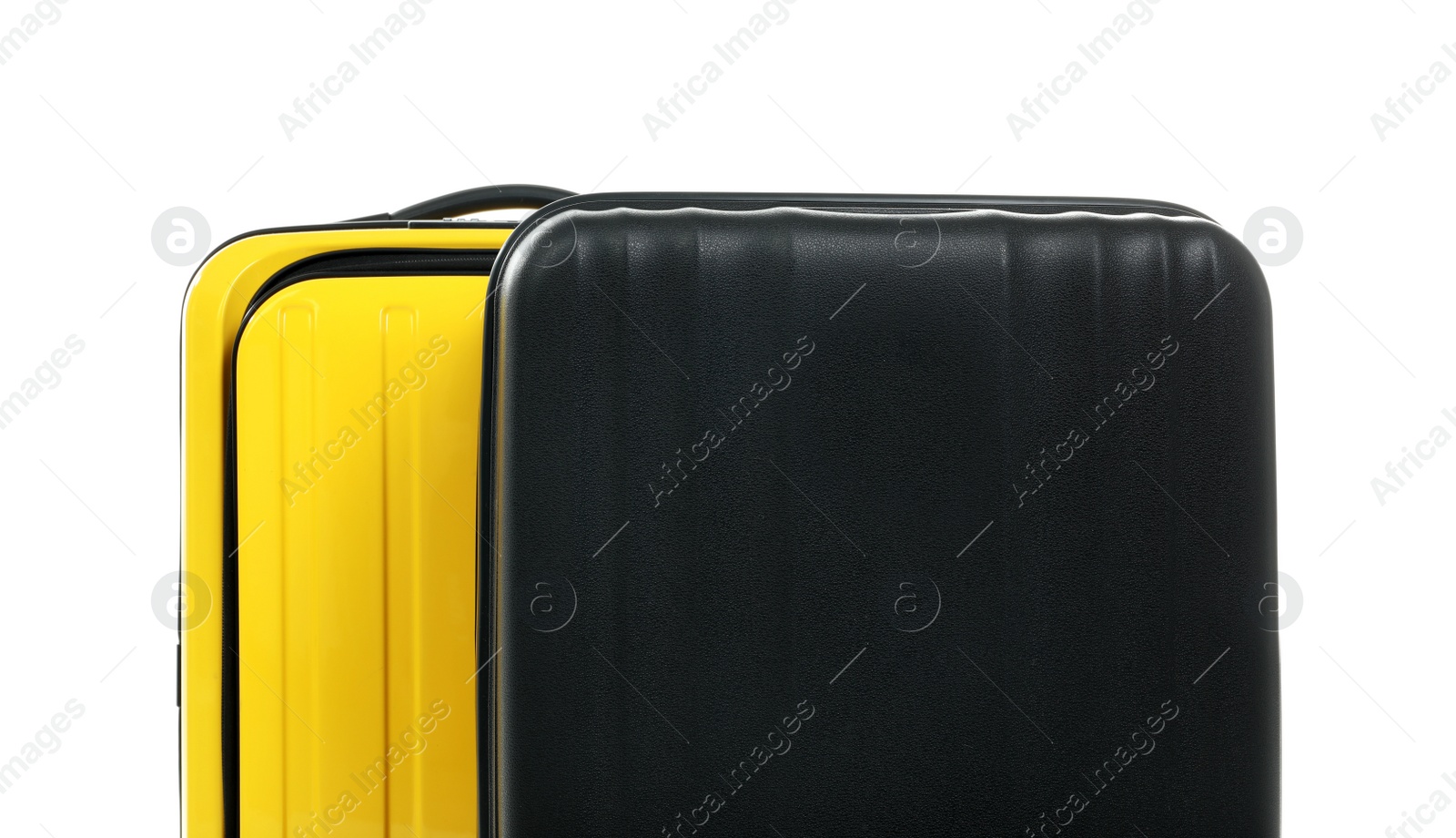 Photo of New suitcases packed for journey on white background