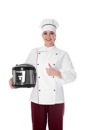 Female chef with modern multi cooker on white background