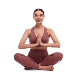 Photo of Beautiful young woman practicing yoga on white background. Lotus pose