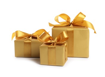 Photo of Three beautiful gift boxes on white background