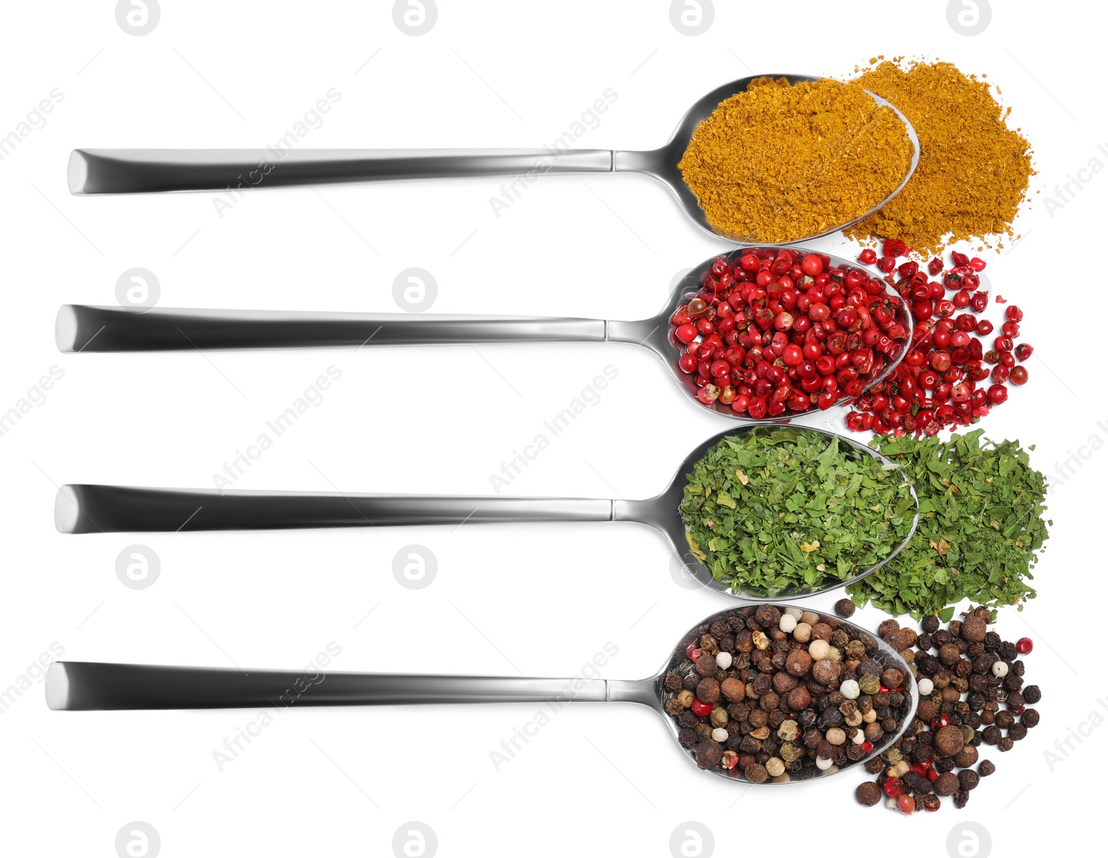 Photo of Metal spoons with different spices on white background, top view