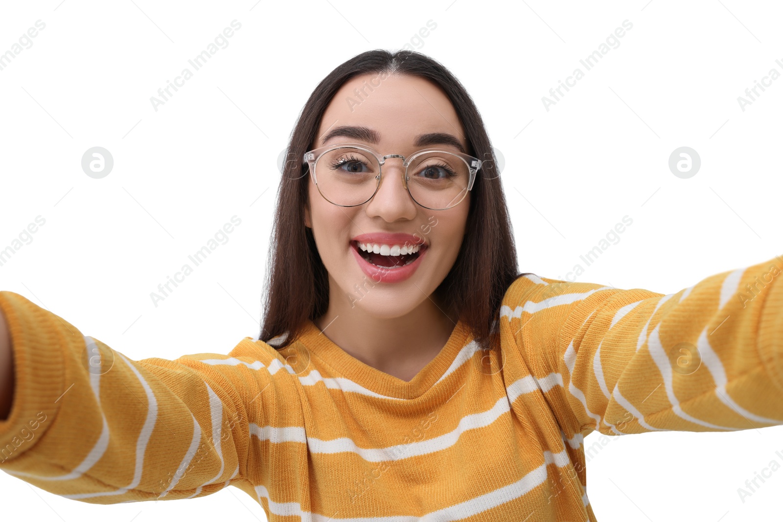 Photo of Smiling young woman taking selfie on white background