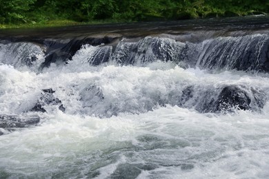 Picturesque view on beautiful river with rapids