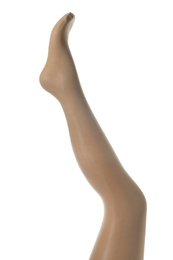 Photo of Leg mannequin in beige tights on white background