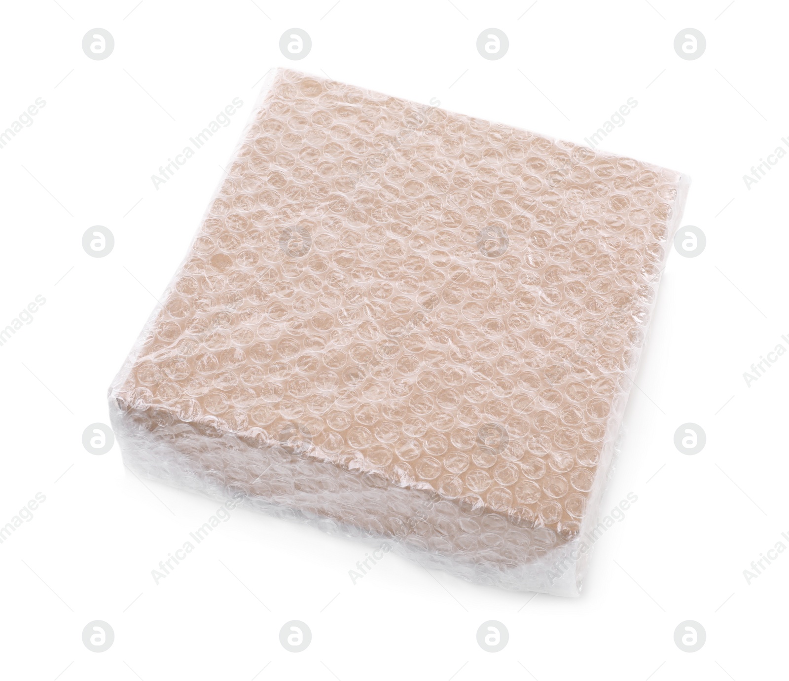 Photo of Cardboard box packed in bubble wrap isolated on white