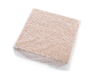 Photo of Cardboard box packed in bubble wrap isolated on white