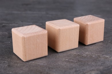 International Organization for Standardization. Cubes with abbreviation ISO on gray textured table, closeup