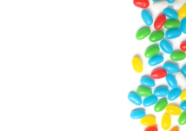 Colorful jelly beans on white background, top view