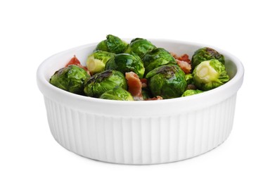 Delicious roasted Brussels sprouts and bacon in bowl isolated on white