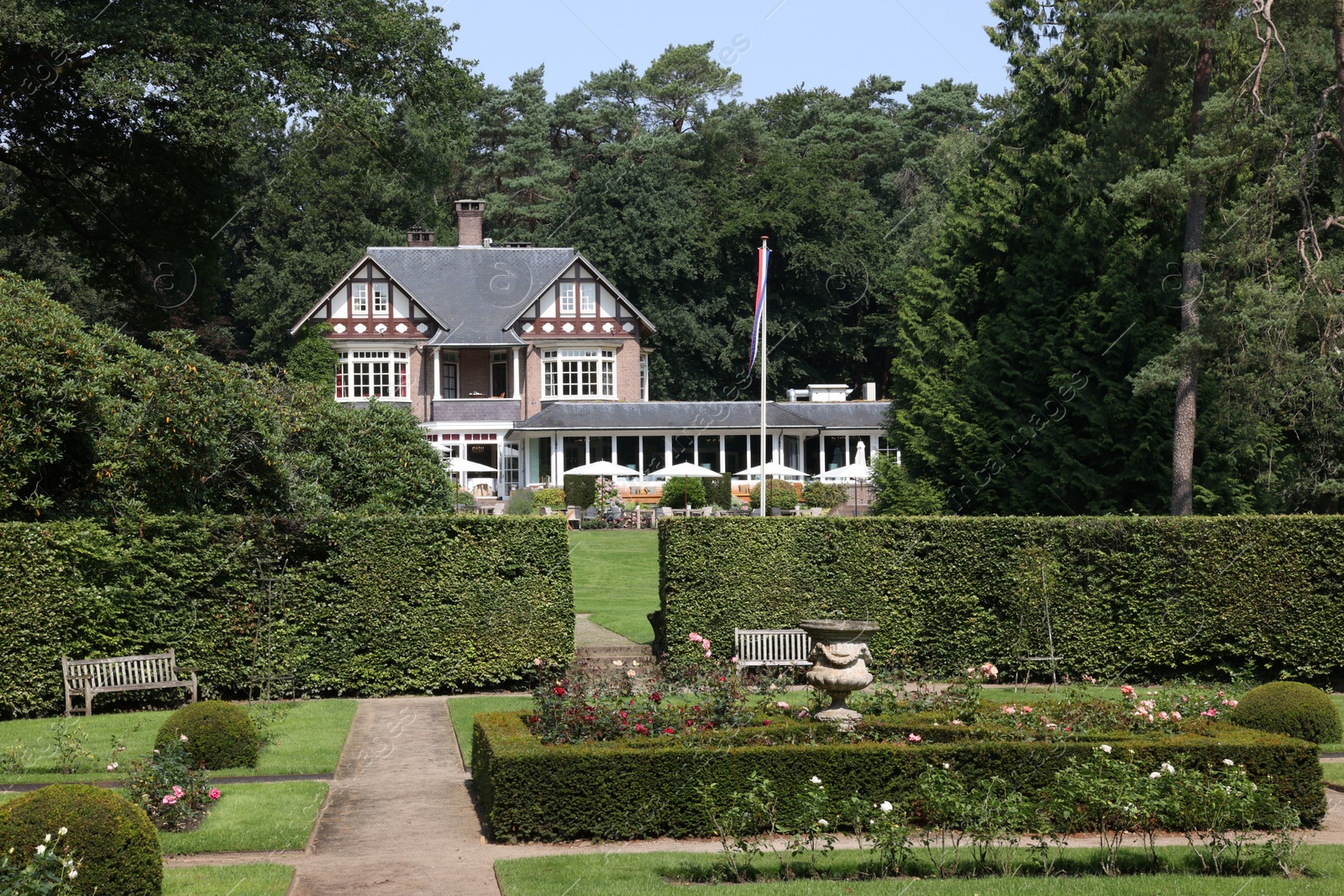 Photo of Ermelo, Netherlands - July 20, 2022: Luxury hotel Het Roode Koper and beautiful plants