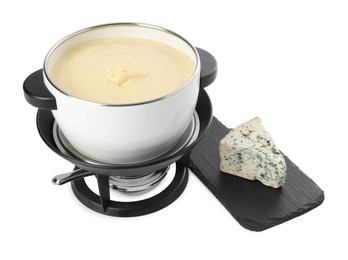 Photo of Fondue with tasty melted cheese and piece isolated on white