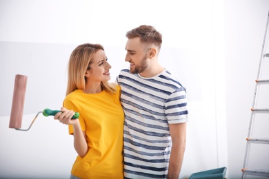 Young couple during apartment renovation, indoors