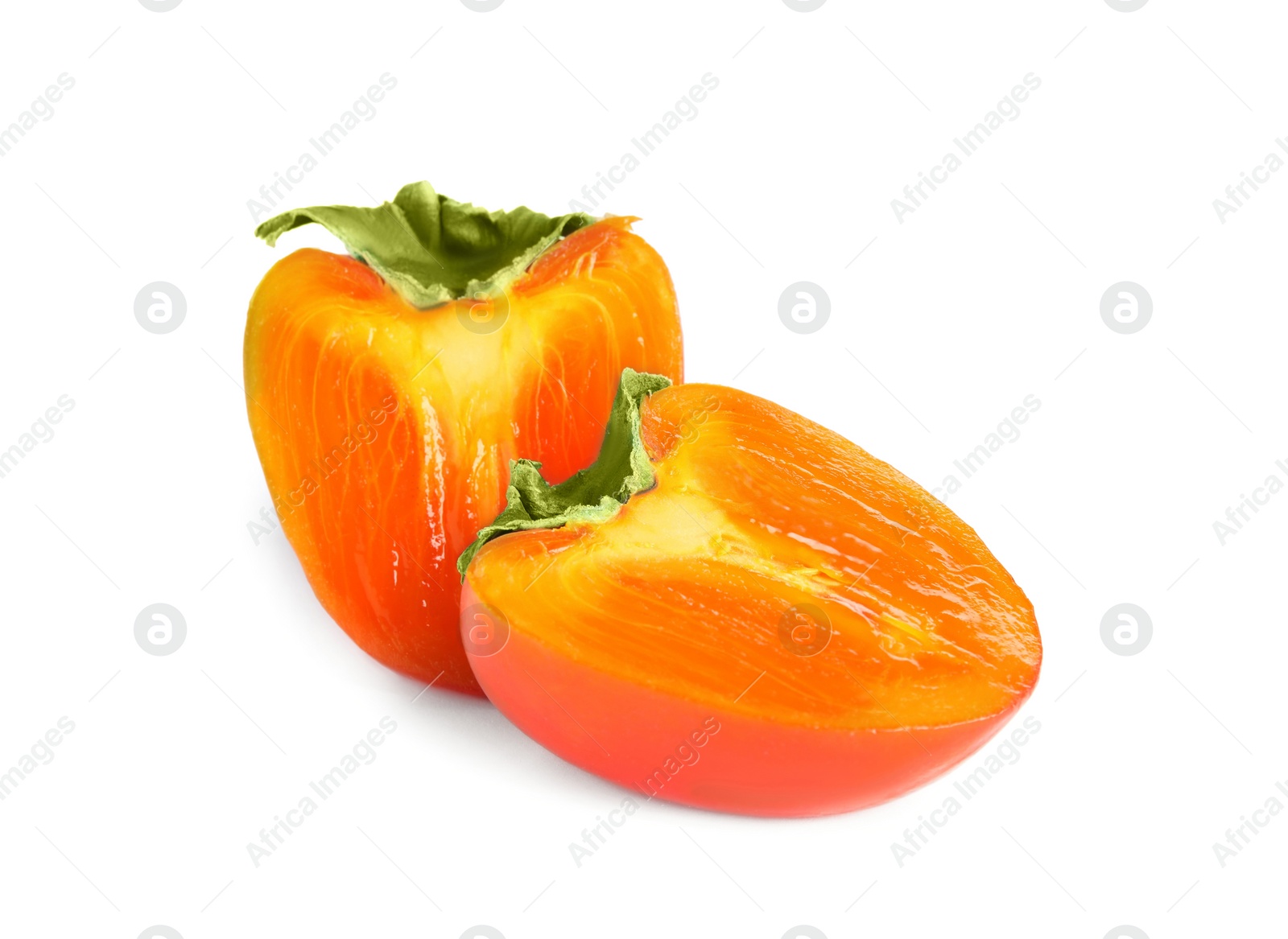 Photo of Delicious cut fresh persimmon isolated on white
