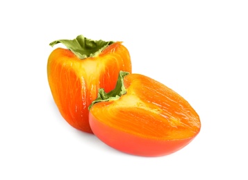 Photo of Delicious cut fresh persimmon isolated on white