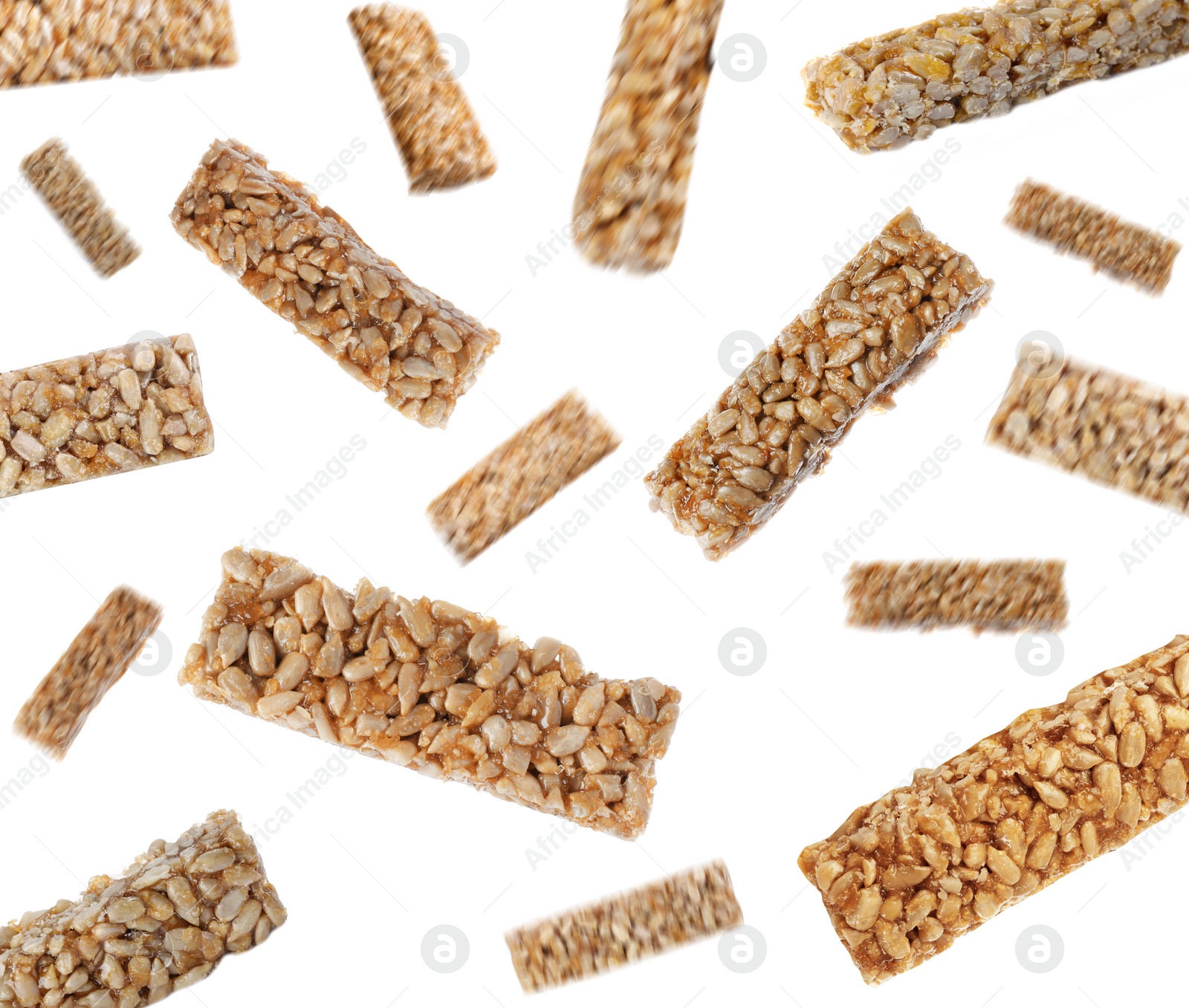 Image of Tasty sweet kozinaki falling on white background