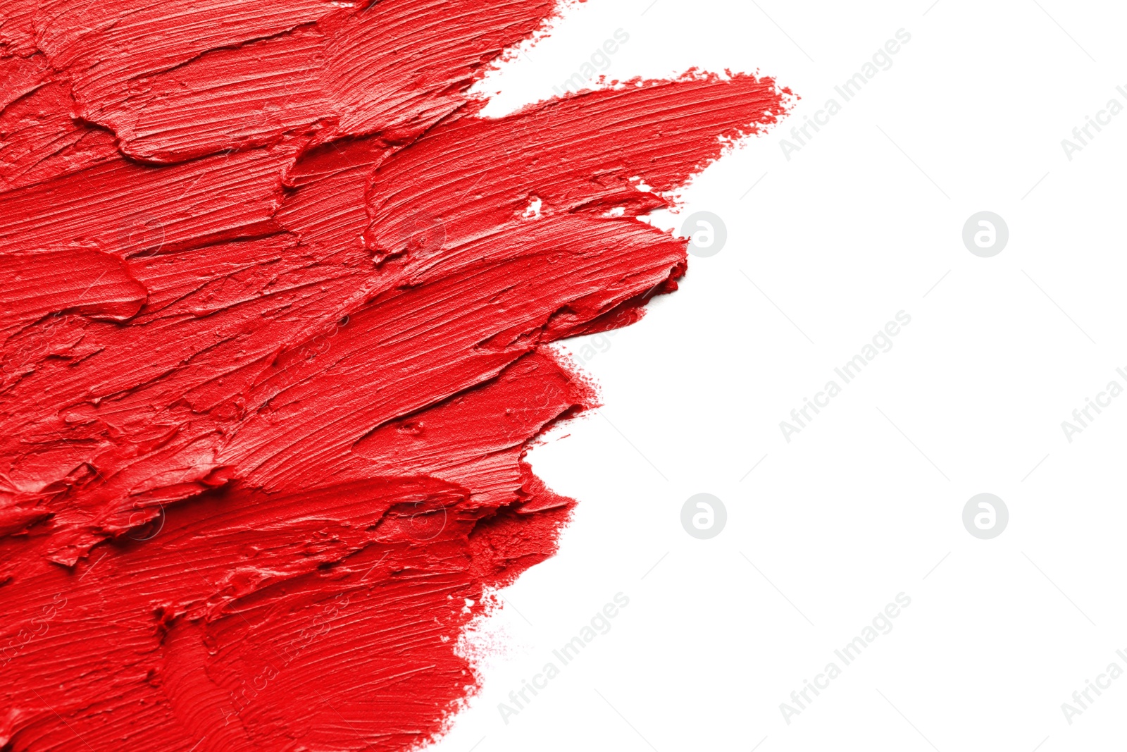 Photo of Strokes of lipstick on white background, top view