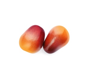 Fresh ripe palm oil fruits on white background