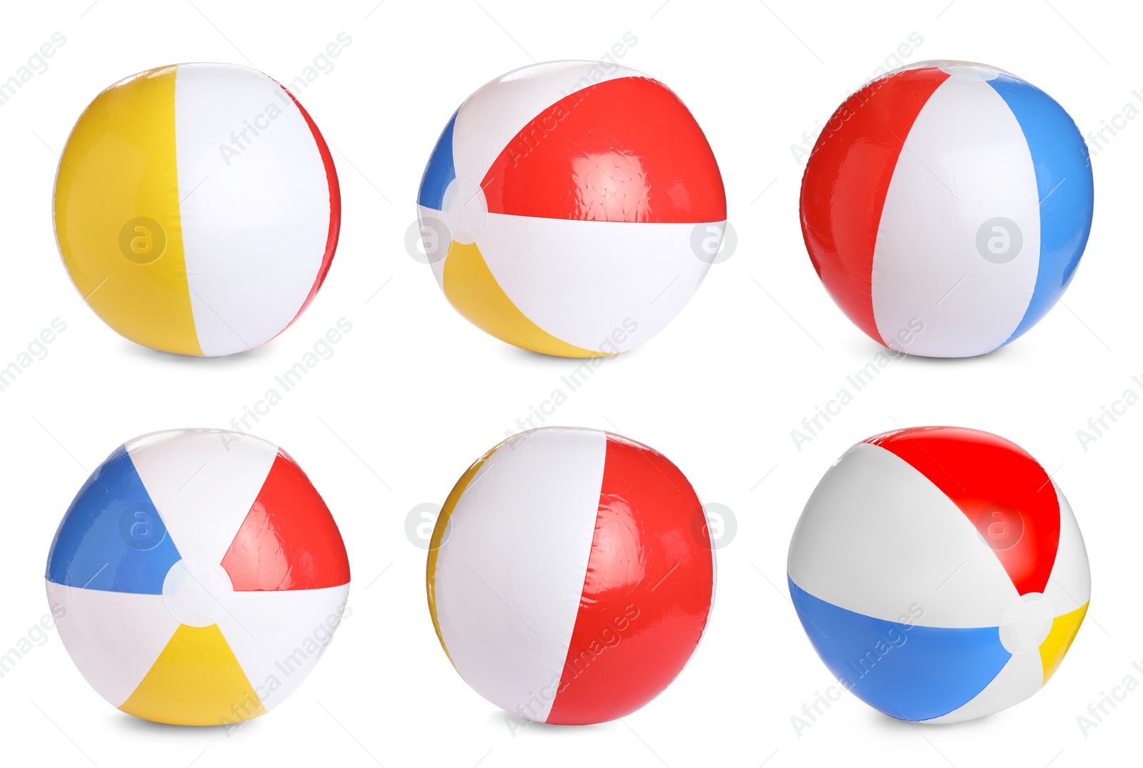 Image of Set with bright inflatable balls on white background 