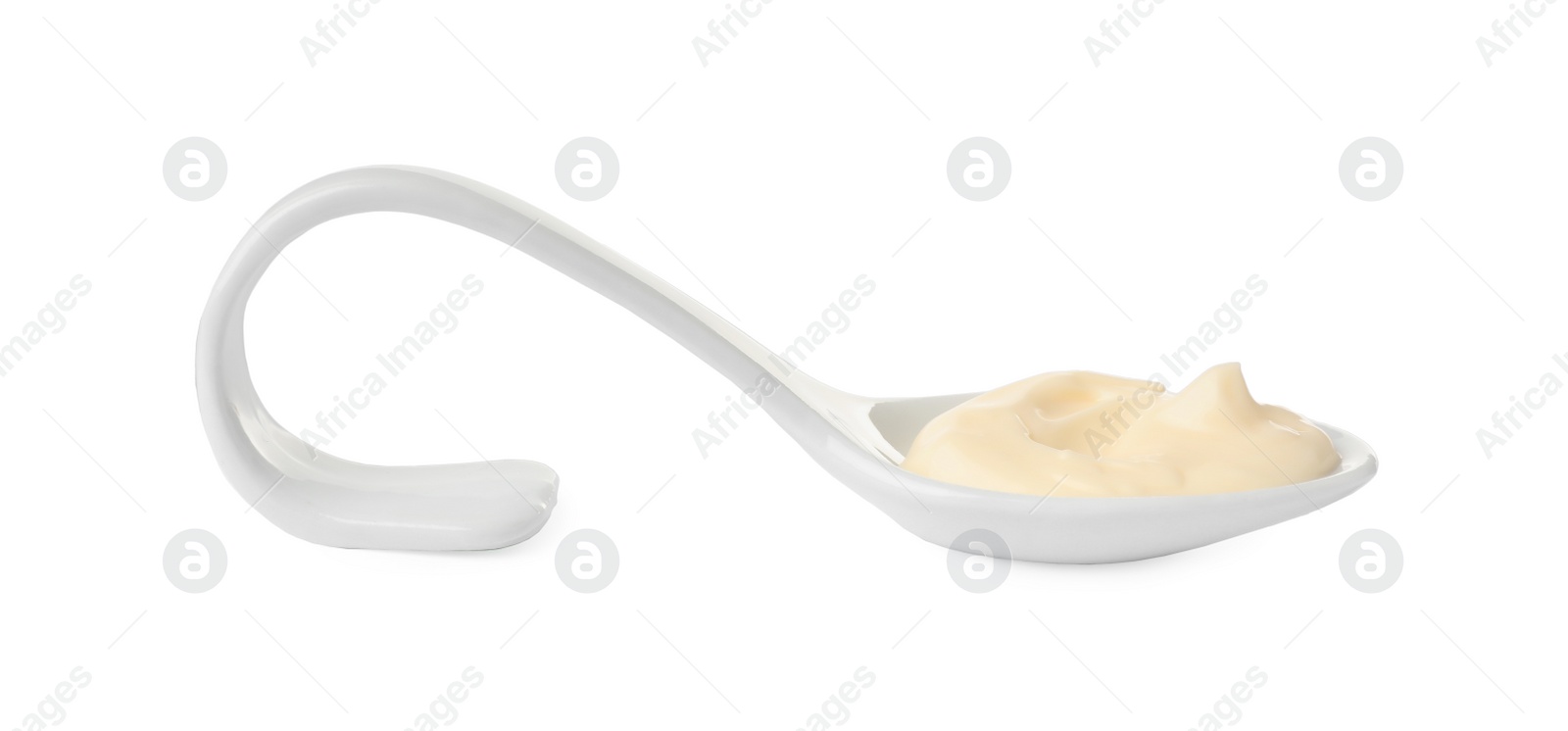 Photo of Mayonnaise in ceramic serving spoon isolated on white