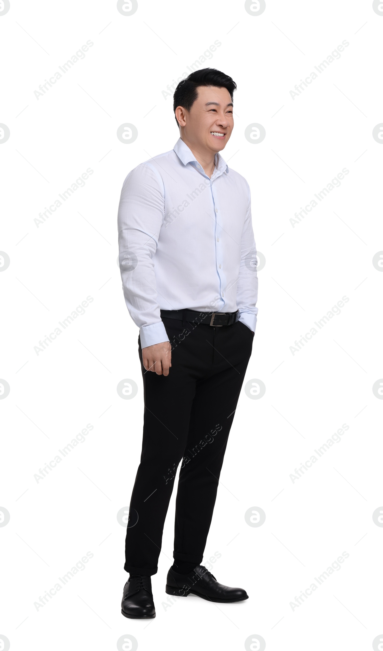 Photo of Businessman in formal clothes posing on white background