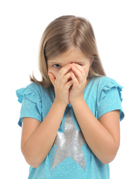 Scared little girl wearing casual outfit on white background