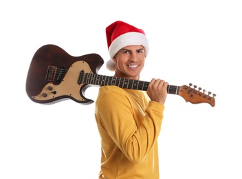 Photo of Man in Santa hat with electric guitar on white background. Christmas music