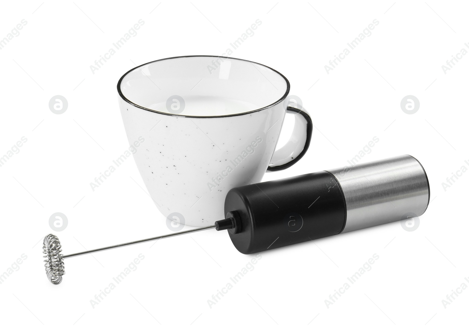 Photo of Milk frother wand and cup isolated on white