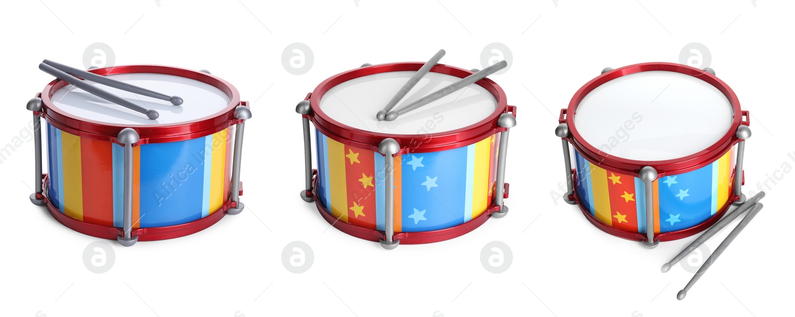 Image of Bright toy drums and sticks on white background, set