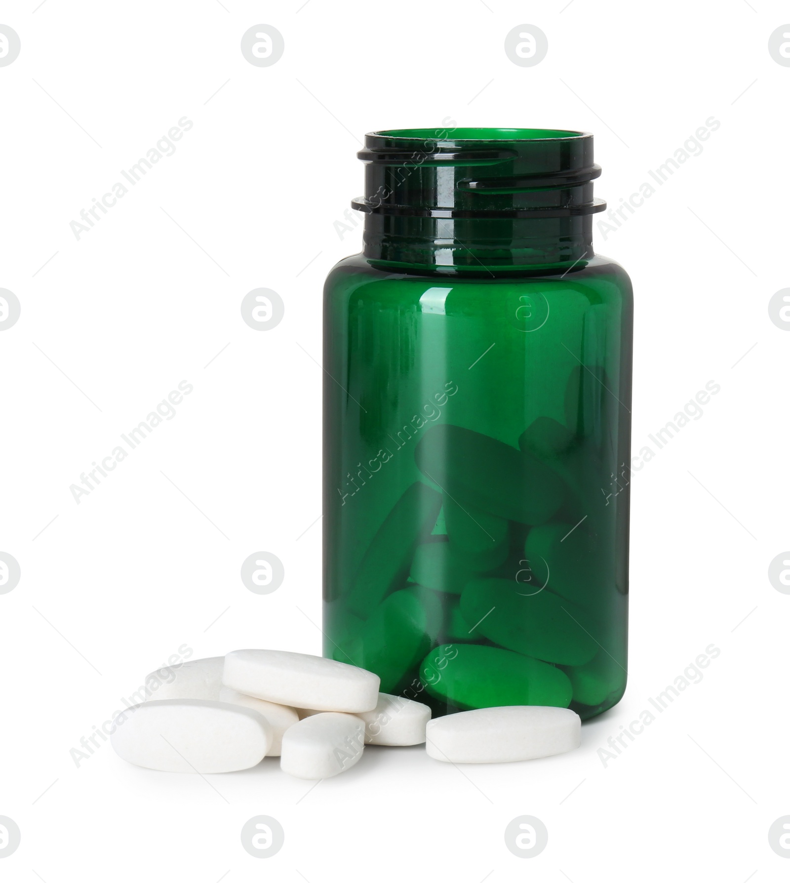 Photo of Bottle and pile of vitamin pills isolated on white