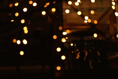 Photo of Beautiful street lights at night. Bokeh effect