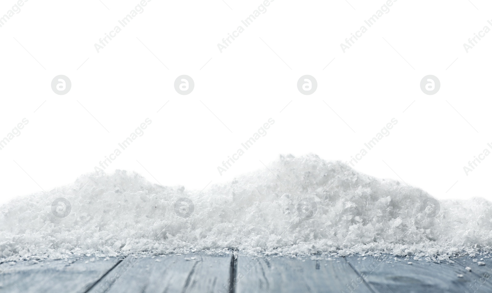 Photo of Wooden surface covered with snow against white background