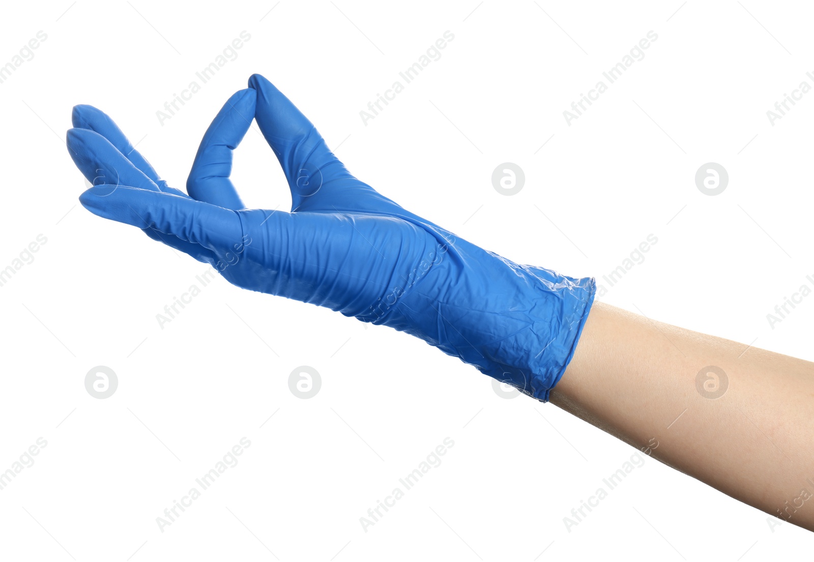 Photo of Woman in blue latex gloves holding something on white background, closeup of hand