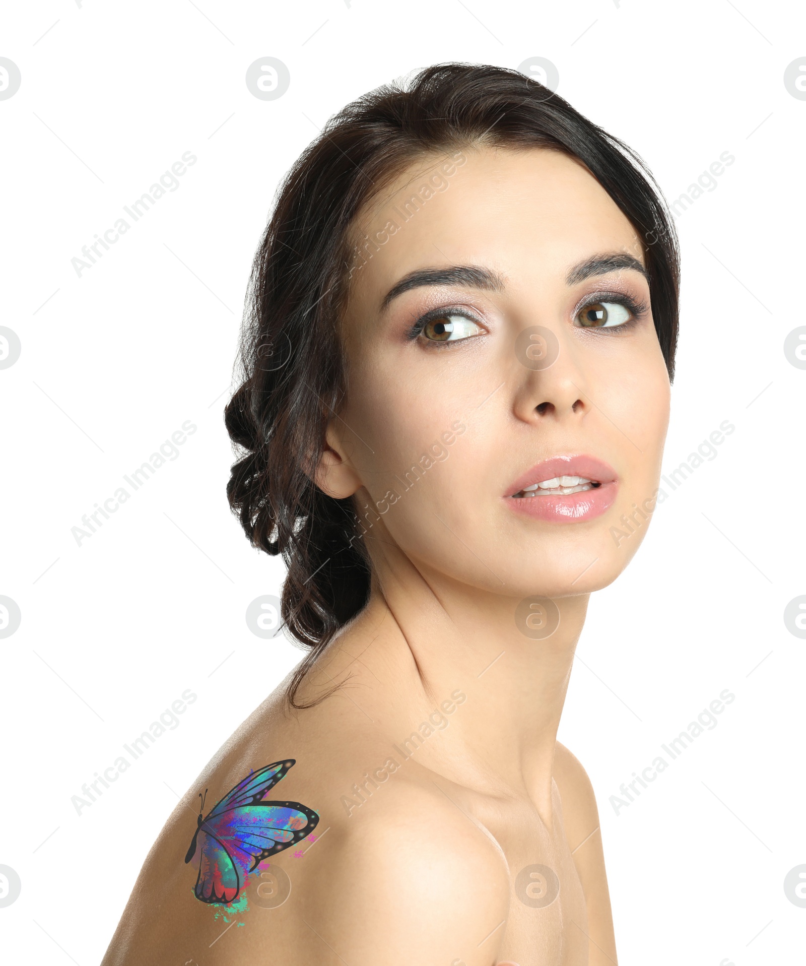 Image of Young woman with colorful tattoo of butterfly on her body against white background