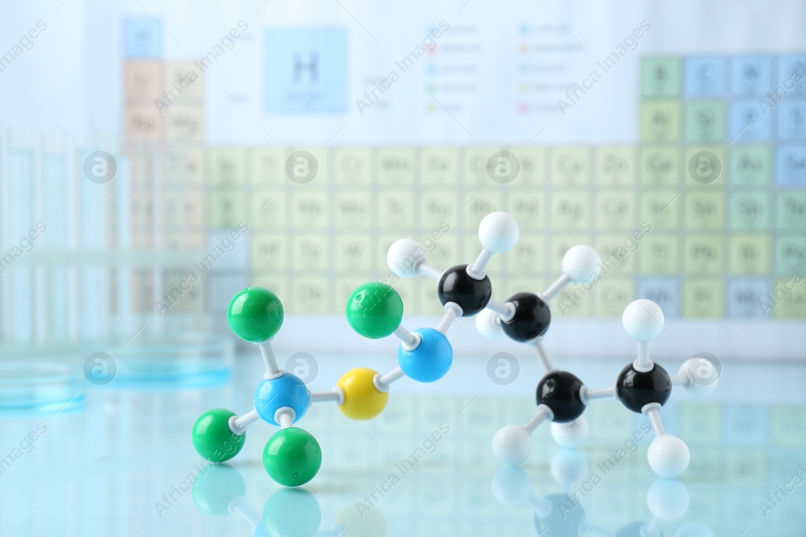 Photo of Molecular model on light surface against blurred background