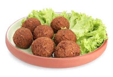 Photo of Plate of delicious falafel balls and lettuce isolated on white. Vegan meat products