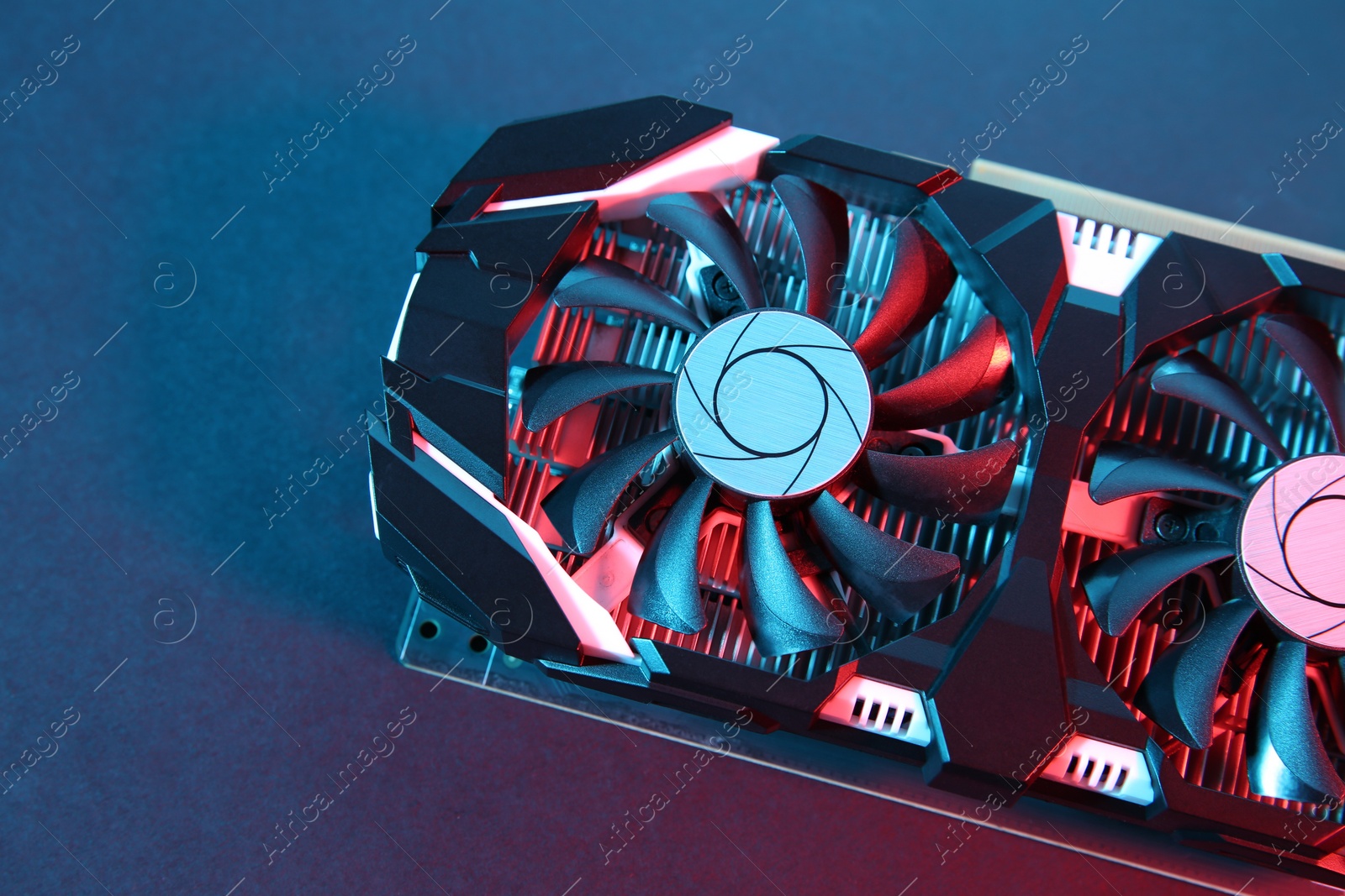 Photo of Computer graphics card on color background, top view. Space for text